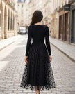 Black 3D floral embroidered mesh knit midi dress by FJØRNA featuring intricate floral embroidery and a fitted midi silhouette.