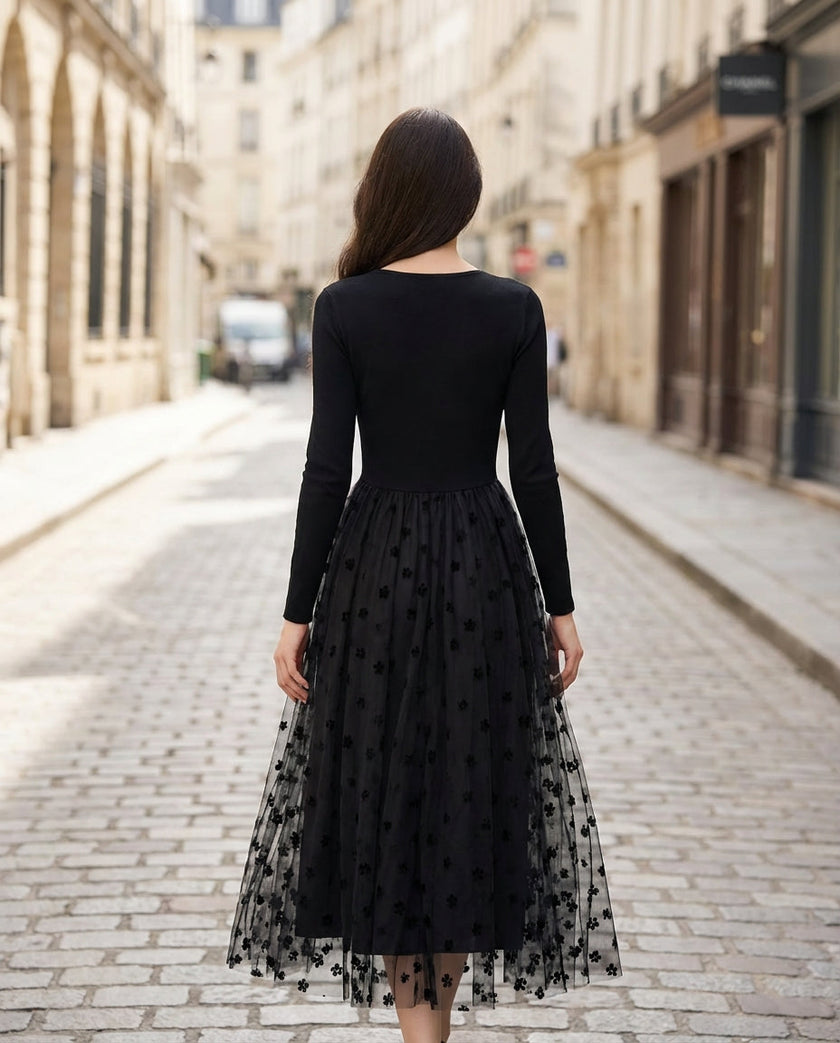 Black 3D floral embroidered mesh knit midi dress by FJØRNA featuring intricate floral embroidery and a fitted midi silhouette.