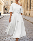 FJØRNA collared waist-tie chiffon midi dress, elegant wedding guest dress, shown in light fabric with a waist tie and button details.