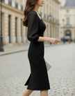 FJØRNA collared button-front belted pleated midi dress for summer, featuring a classic design with a waist belt and pleated skirt.
