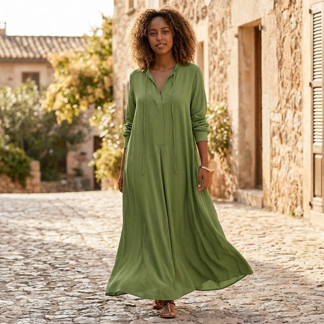 FJØRNA loose fit maxi shirt dress with long sleeves and V-neck, showcasing soft fabric and relaxed silhouette.