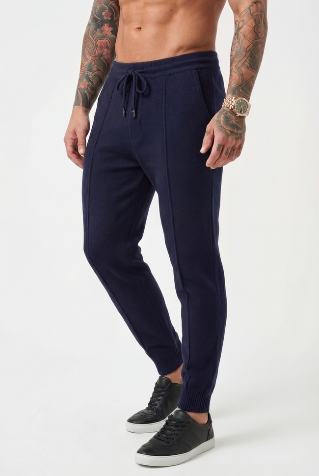 Men's navy Merino wool trousers by FJØRNA, showcasing tailored fit and soft fabric, perfect for stylish, comfortable wear.
