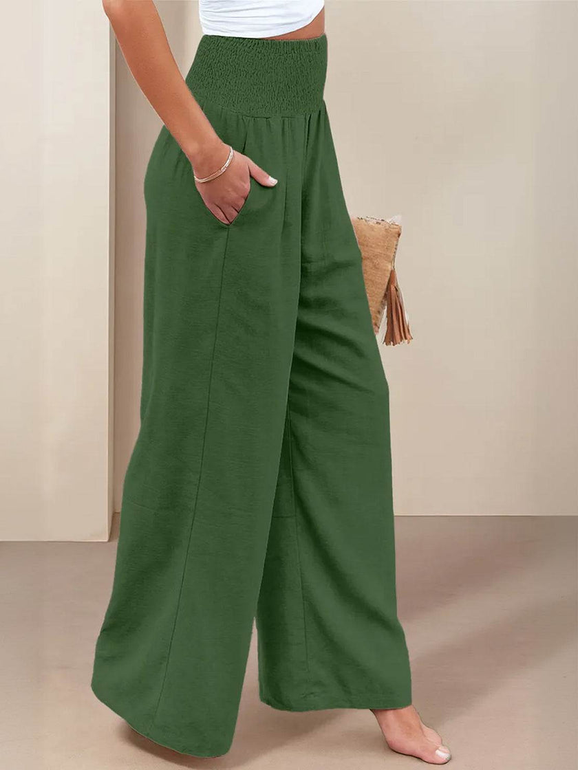 High-waist linen summer trousers for women by FJØRNA, wide-leg palazzo style in soft cotton-linen fabric.