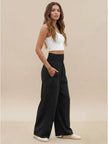 High-waist linen summer trousers for women, FJØRNA brand, wide-leg palazzo style, lightweight cotton-linen fabric, casual fashion.