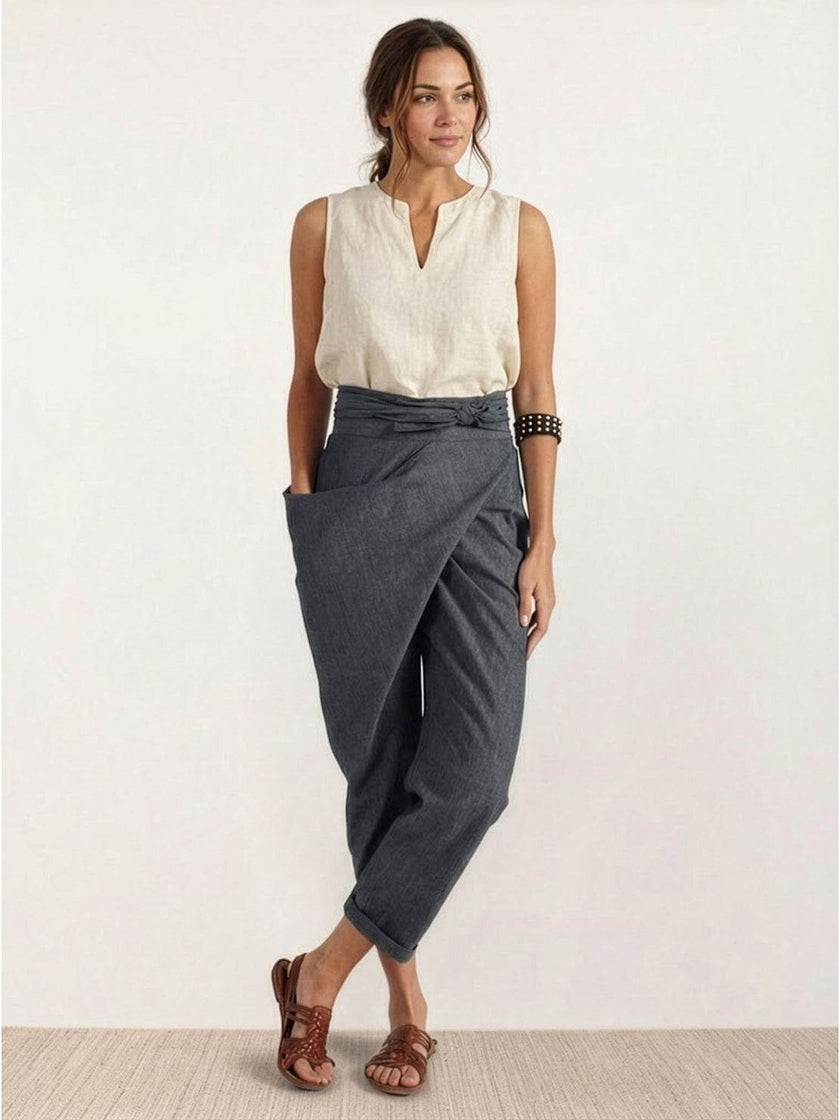 FJØRNA women's lightweight summer trousers with high waist, wide leg, tapered fit, made from soft, comfortable fabric.