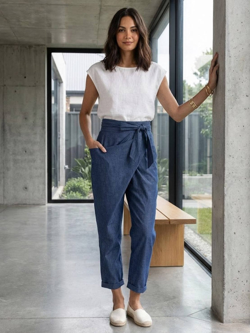 FJØRNA women's lightweight summer trousers with high waist, wide leg, tapered fit, and comfortable fabric for casual wear.