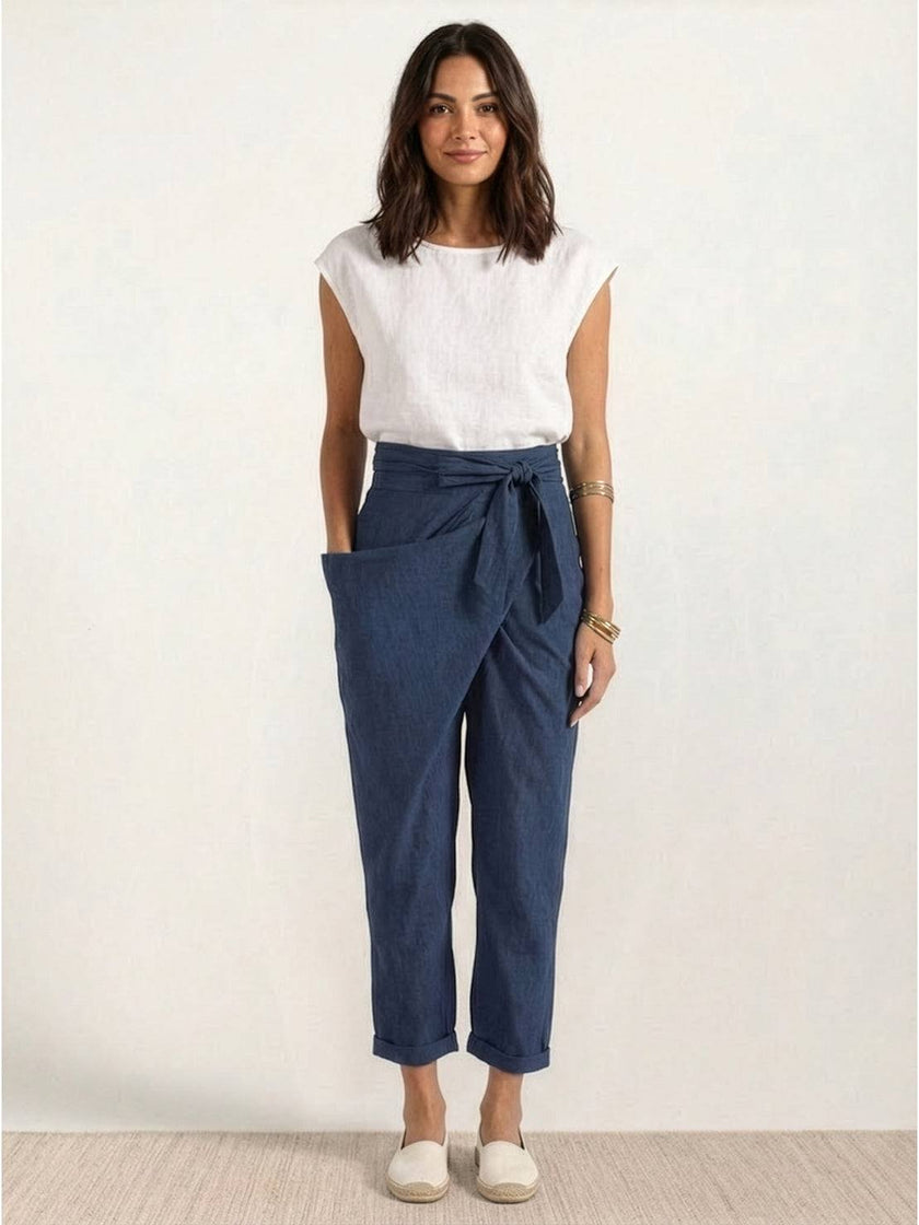 FJØRNA women's lightweight summer trousers with high waist, wide leg, and tapered fit, made for comfortable, stylish wear.