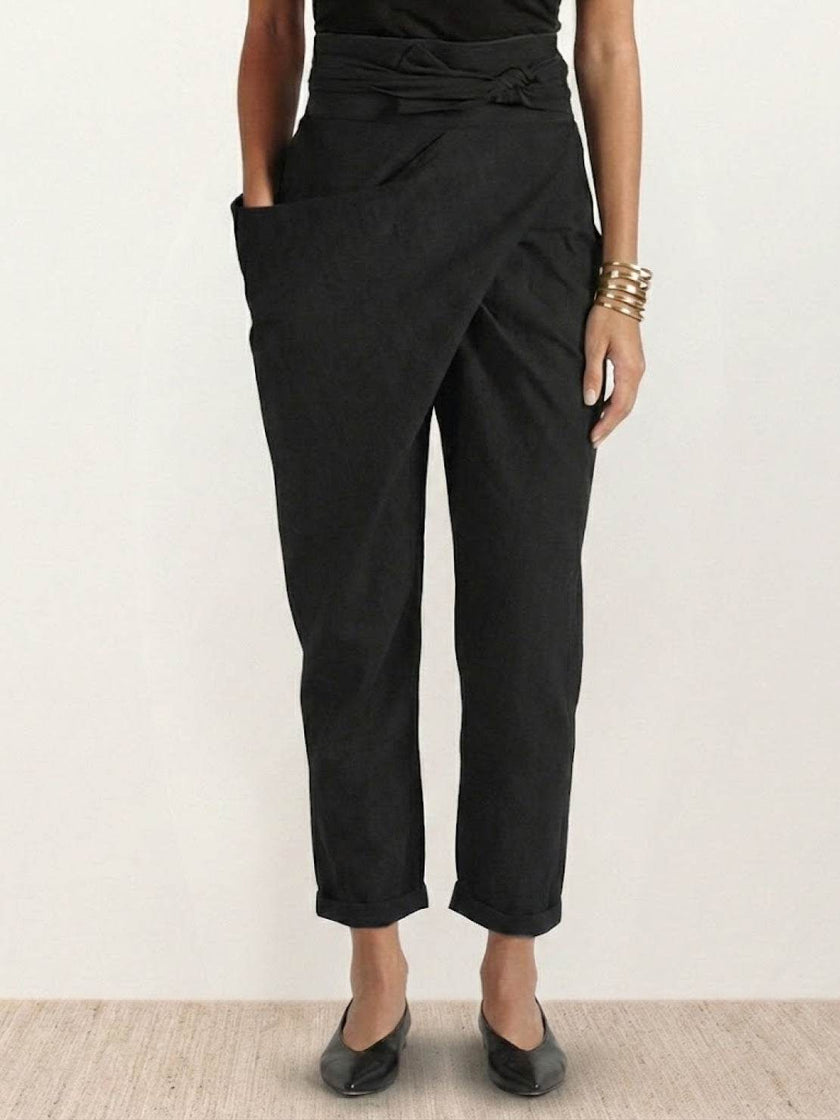 FJØRNA lightweight women's summer trousers with high waist, wide leg, tapered fit, made of soft, comfortable fabric.