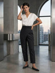 FJØRNA women's lightweight summer trousers with high waist, wide leg, and tapered fit, made for comfortable, stylish wear.