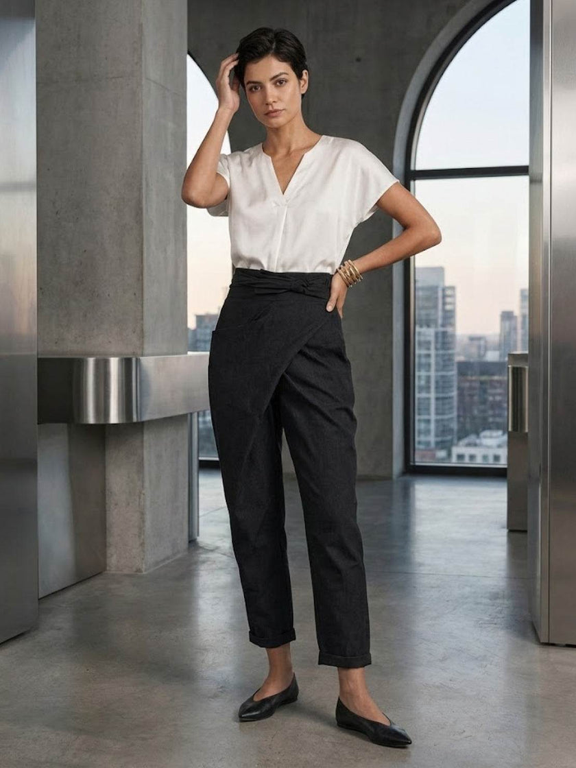 FJØRNA women's lightweight summer trousers with high waist, wide leg, and tapered fit, made for comfortable, stylish wear.