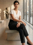 FJØRNA women's lightweight summer trousers with high waist, wide leg, tapered fit, and comfortable fabric for casual wear.