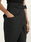 FJØRNA lightweight summer women's trousers with high-waist, wide-leg, tapered fit, and wrapped, comfortable fabric.