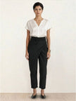 FJØRNA women's high-waist lightweight summer trousers with wide-leg and tapered fit, featuring a comfortable wrapped design.