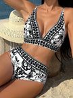 Women's high waist floral V-neck bikini by FJØRNA, featuring a colorful floral pattern and stylish design for summer swimwear.