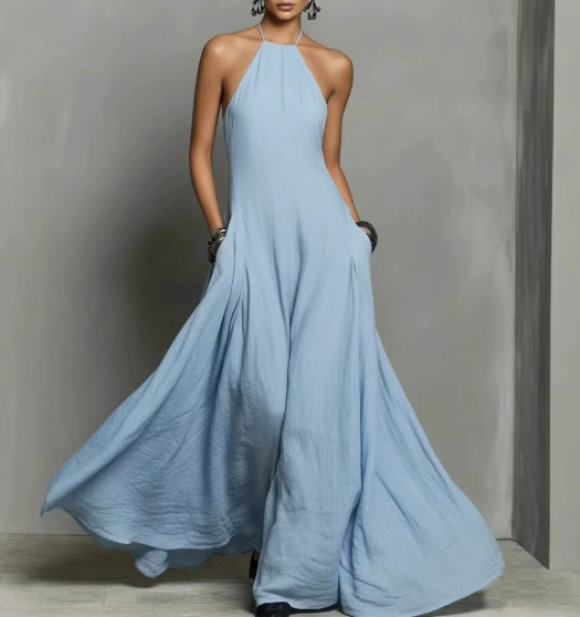 FJØRNA linen halter neck maxi dress for women, featuring a flowing, lightweight design with a halter neckline and full-length silhouette.