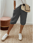 FJØRNA lightweight summer capri pants for women with drawstring elastic waist and relaxed fit, suitable for warm weather.