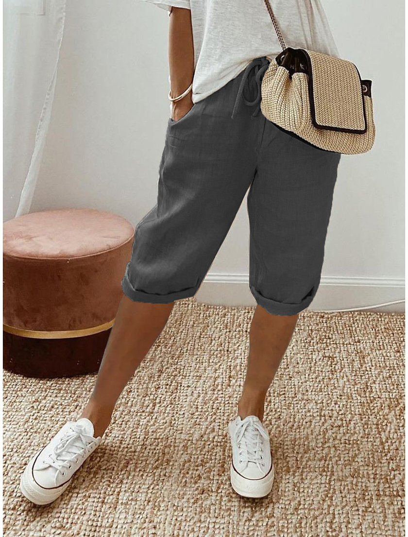 FJØRNA lightweight summer capri pants for women with drawstring elastic waist and relaxed fit, suitable for warm weather.