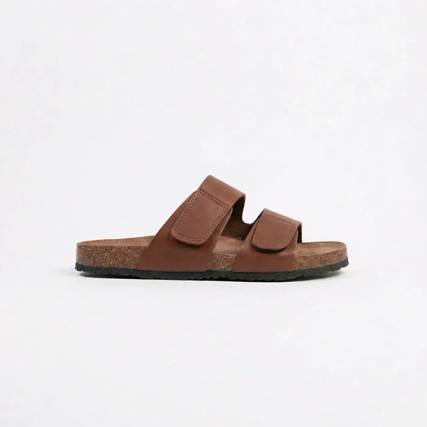 FJØRNA men's double strap open toe slides showing black leather straps and cushioned footbed for comfortable summer wear