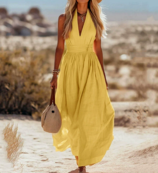 FJØRNA women's sleeveless bohemian cotton maxi dress with elegant resort style, flowing and comfortable for warm-weather wear.