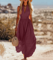 FJØRNA women's bohemian sleeveless cotton maxi dress with elegant resort style, featuring a flowing silhouette and intricate details.
