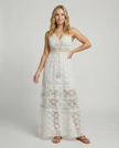 FJØRNA elegant floral maxi dress for women with V-neck and sleeveless design, flowing and perfect for summer occasions.
