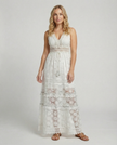 FJØRNA elegant floral maxi dress for women with V-neck and sleeveless design, perfect for summer or special occasions.