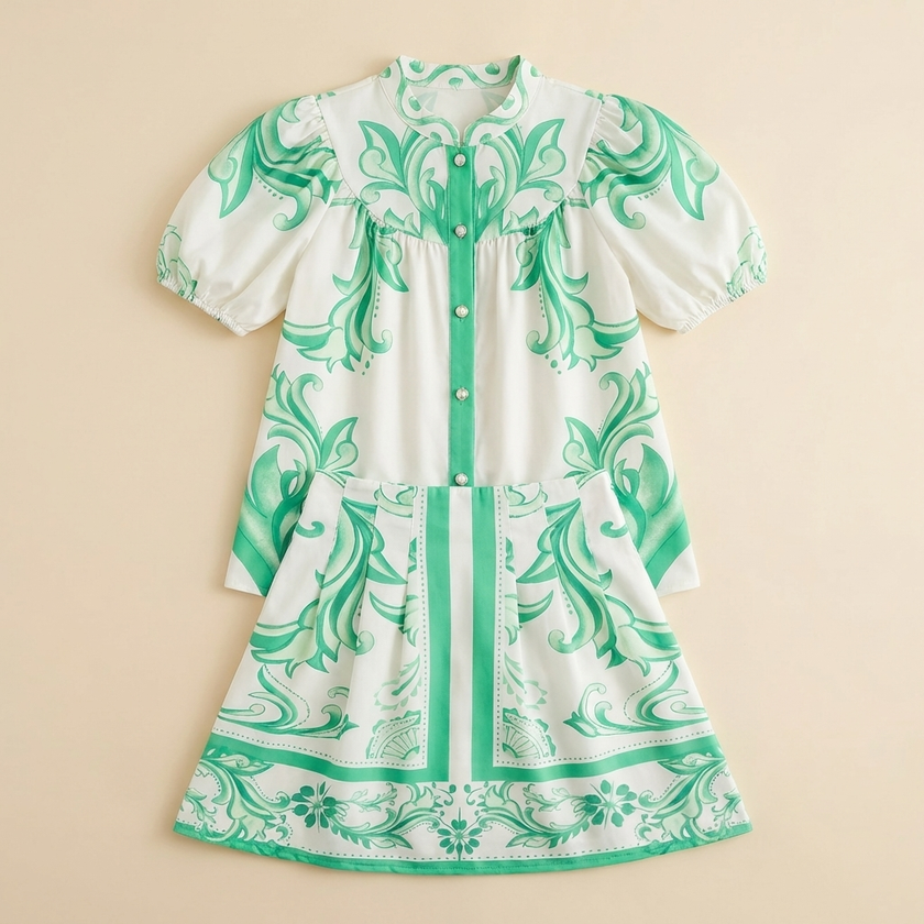 Elegant women's linen floral two-piece co-ord set by FJØRNA, featuring a stylish top and matching pants with a floral pattern.