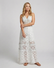 Floral V-neck sleeveless elegant maxi dress for women by FJØRNA, flowing fabric and vibrant floral pattern.