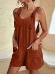 FJØRNA linen summer romper for women with pockets, perfect for beachwear and casual summer outings.