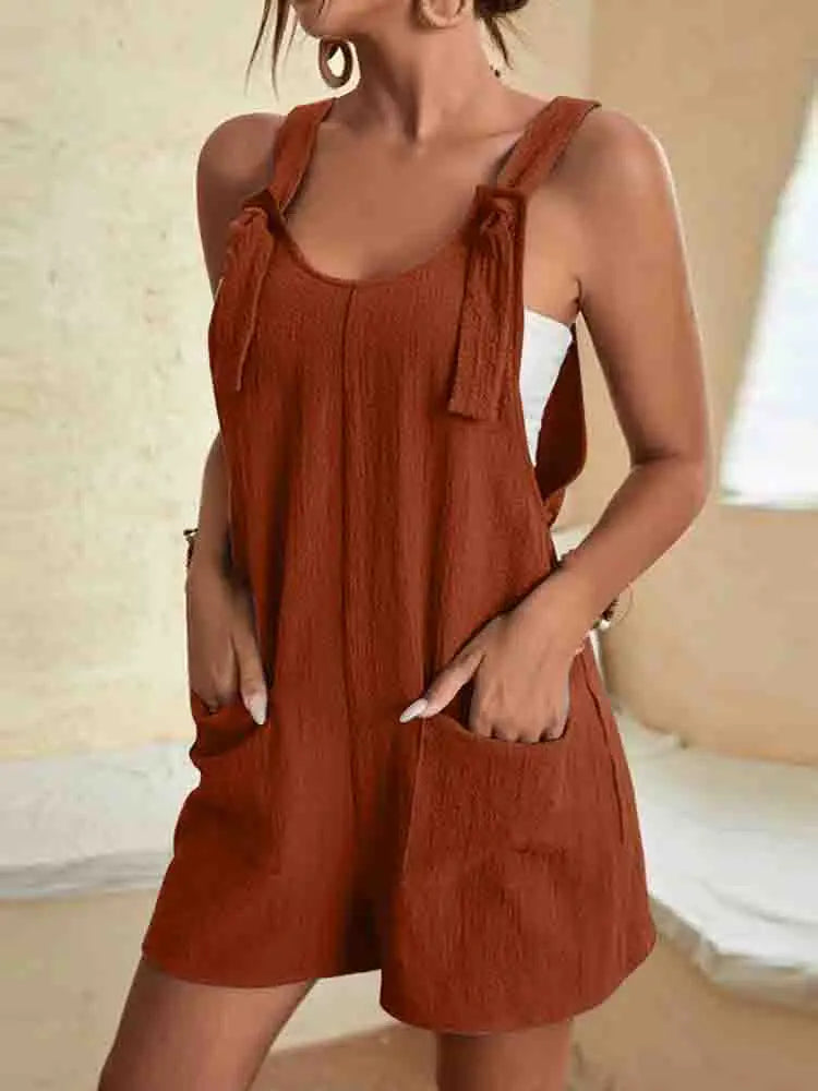 FJØRNA linen summer romper for women with pockets, perfect for beachwear and casual summer outings.