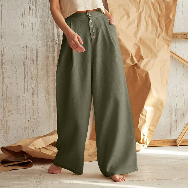 FJØRNA women's knit wide-leg trousers with elastic waistband, featuring a relaxed fit and soft fabric in neutral color.