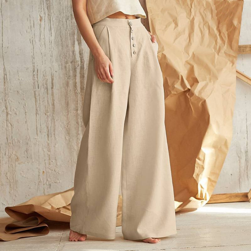 FJØRNA women's knit wide-leg trousers with elastic waist, featuring a relaxed fit and soft fabric for comfort.