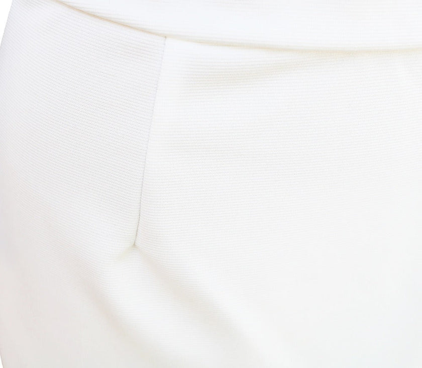 White FJØRNA dress with bat sleeves and waist-cinching design, elegant and fashionable for a stylish look