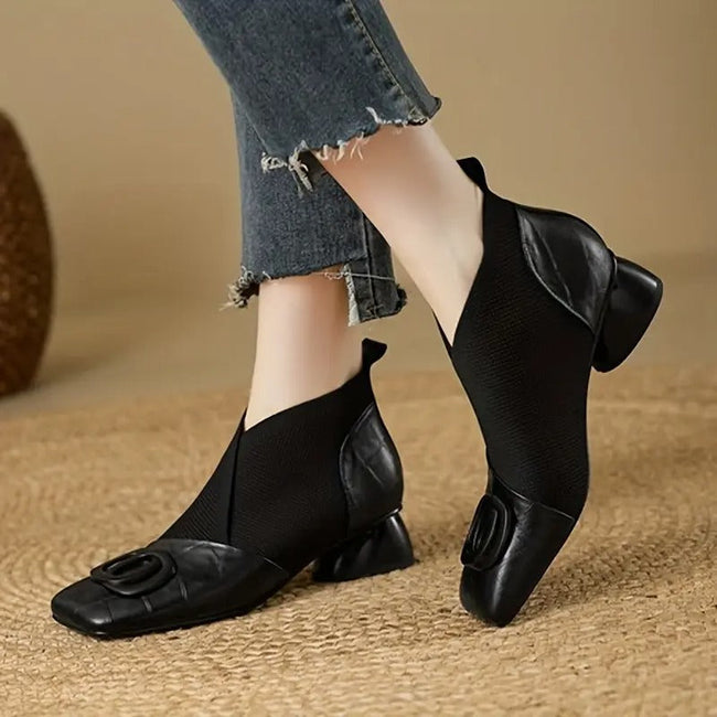 FJØRNA women's orthopedic ankle boots with heels and non-slip soles, stylish footwear designed for comfort and support.
