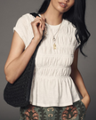 FJØRNA women's linen ruched ruffle top, casual sleeveless blouse with gathered ruffle details and a relaxed fit.