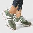 FJØRNA women's orthopedic sneakers with cushioned insoles and classic design, perfect for comfortable everyday wear.