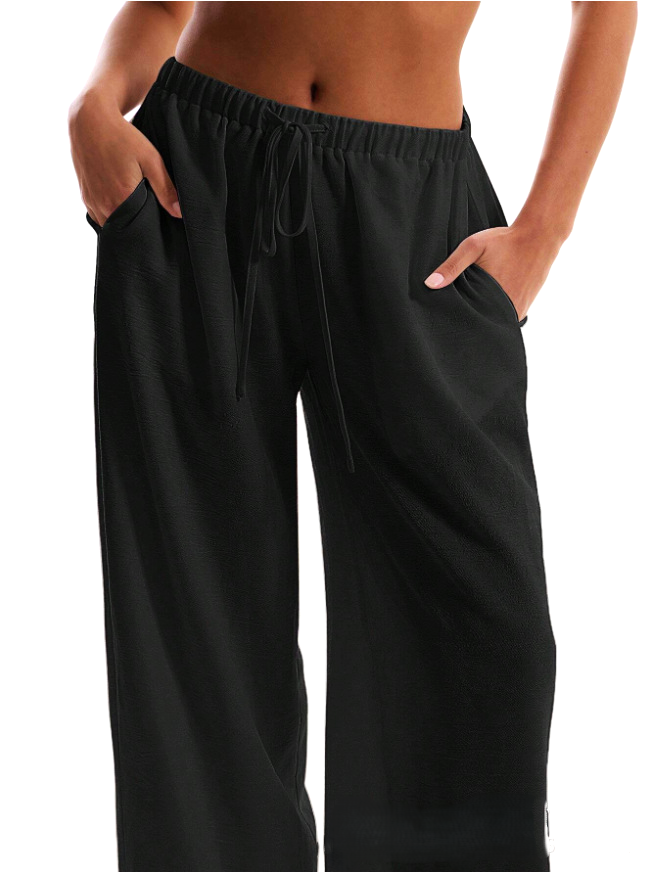 FJØRNA linen-blend wide-leg women's trousers, loose pull-on pants, shown in a relaxed fit with a high waist and wide-leg design.