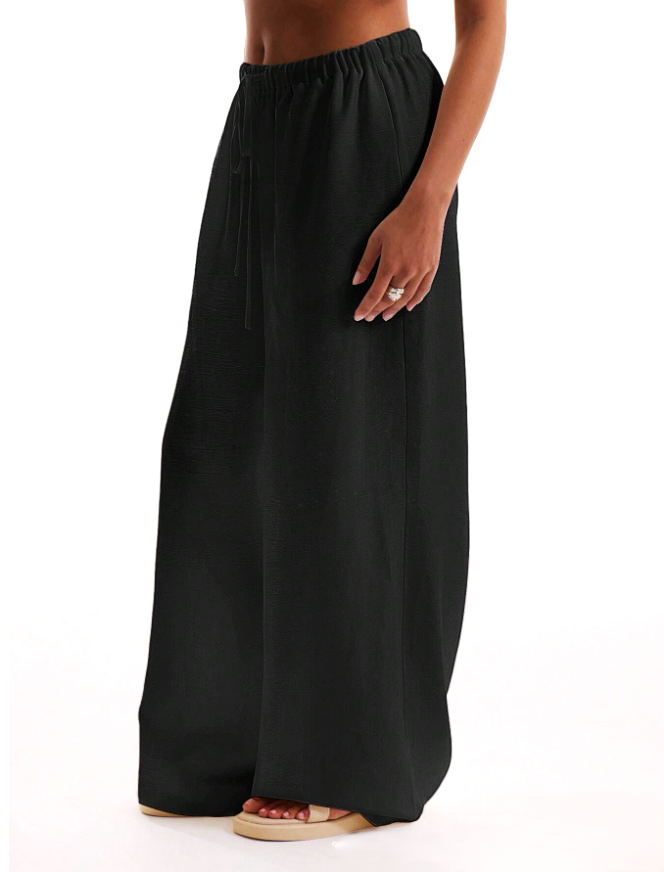 FJØRNA linen-blend wide-leg women’s trousers, loose pull-on pants shown in a relaxed fit with a comfortable waistband.