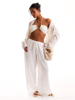 FJØRNA linen-blend wide-leg women's trousers, loose pull-on pants, showcasing relaxed fit and lightweight fabric.