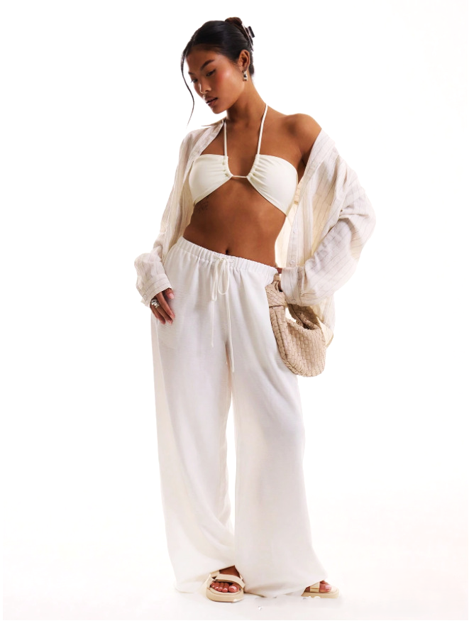 FJØRNA linen-blend wide-leg women's trousers, loose pull-on pants, showcasing relaxed fit and lightweight fabric.