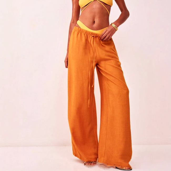 FJØRNA linen-blend wide-leg women's trousers, loose pull-on pants with relaxed fit, light fabric, and stylish design.