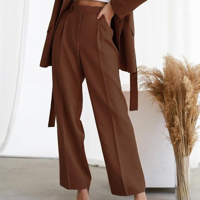 FJØRNA women's lightweight summer trousers with high waist and wide-leg pleated design, perfect for casual and stylish summer wear.