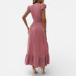 Women's sleeveless maxi dress by FJØRNA featuring a flowy fit and timeless style, perfect for elegant summer occasions.