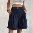 FJØRNA women's lightweight summer shorts with wide leg and high waist, shown in a casual fit on a model.