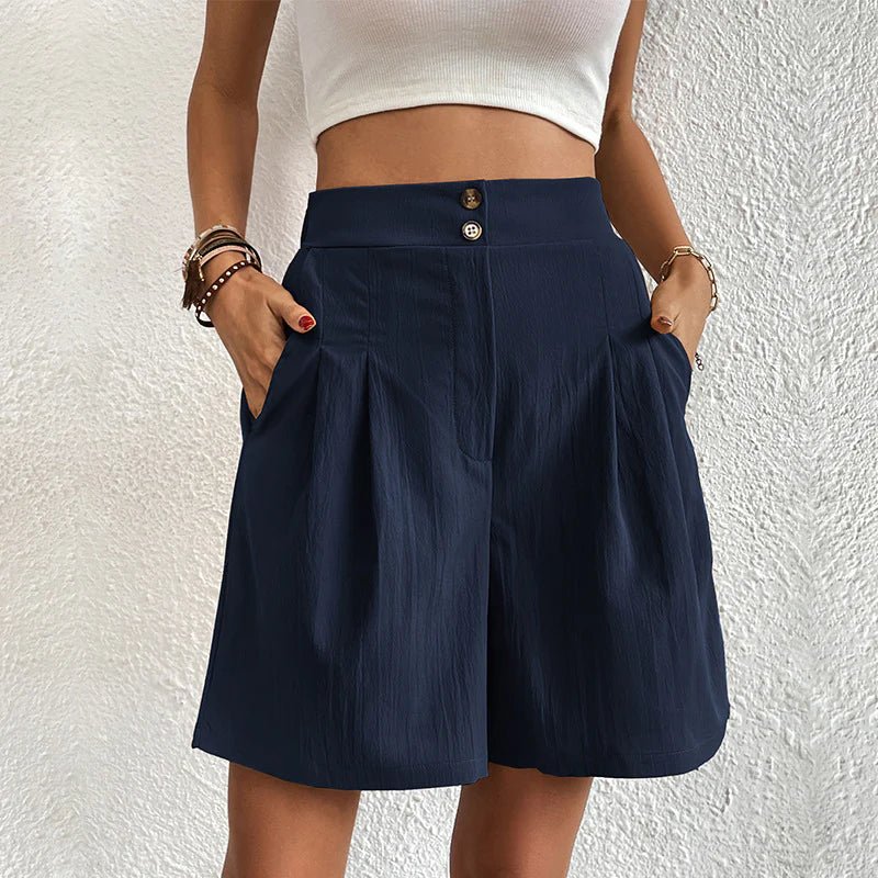 FJØRNA women's lightweight summer shorts with wide leg and high waist, shown in a casual fit on a model.