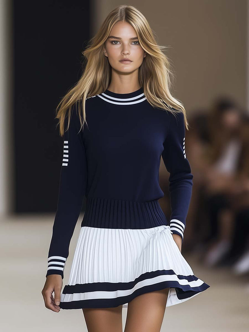 Navy blue FJØRNA mini dress for women, featuring a stylish and fitted design, ideal for casual and semi-formal occasions.