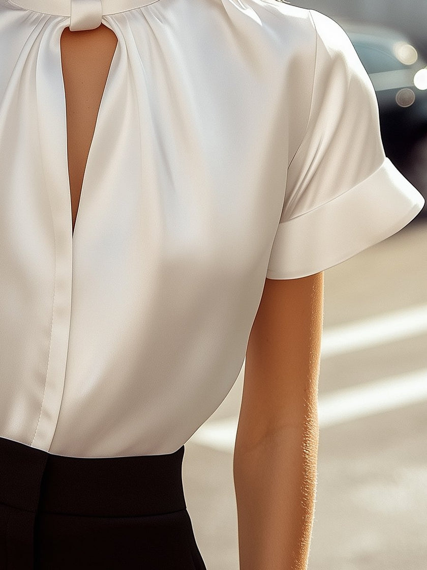 White satin high-neck keyhole blouse for women by FJØRNA, featuring a stylish high neckline and elegant keyhole detail.