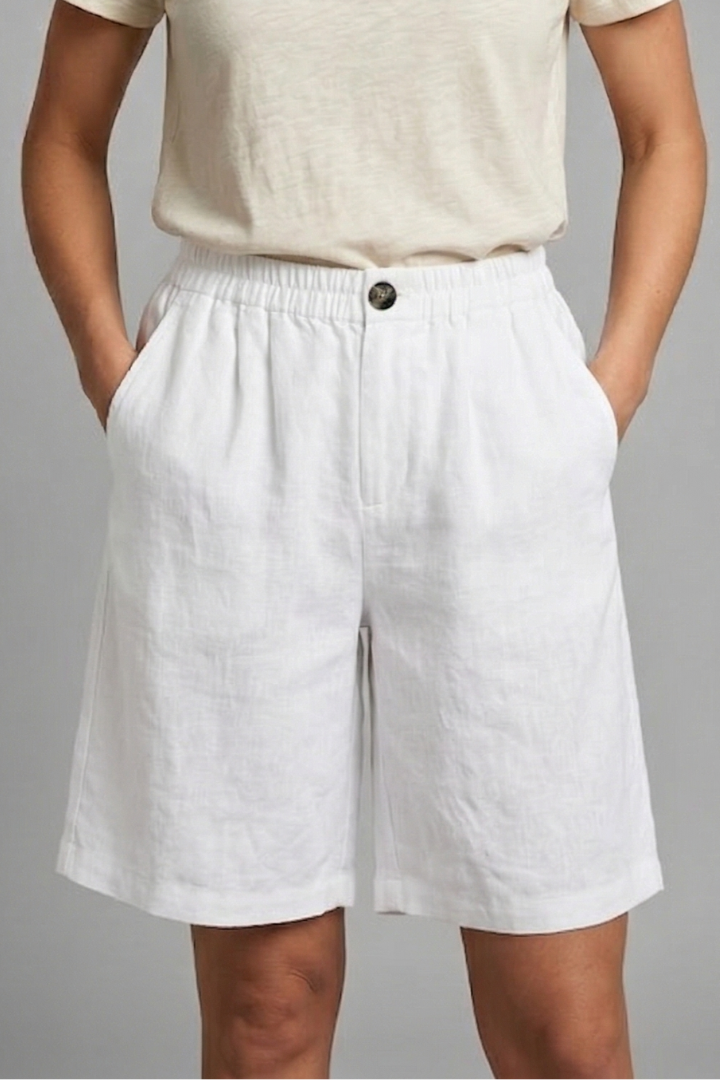 FJØRNA women's lightweight summer shorts with elastic waist, relaxed fit, breathable fabric, and side pockets.