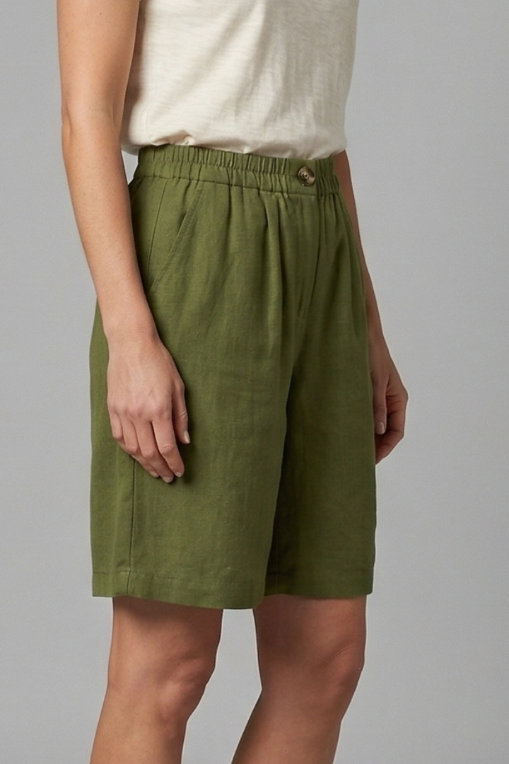 FJØRNA women's lightweight summer shorts with elastic waist, relaxed fit, breathable fabric, and side pockets.