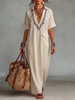 Red linen embroidered maxi dress for women by FJØRNA featuring intricate embroidery and flowing silhouette.